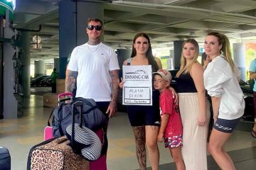 Driver at Da Nang Airport holding a sign with your name, ready for your private transfer to Hoi An.