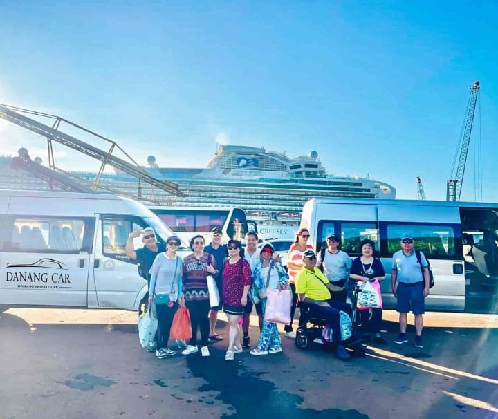 A welcoming scene at Chan May Port with a driver holding a sign.