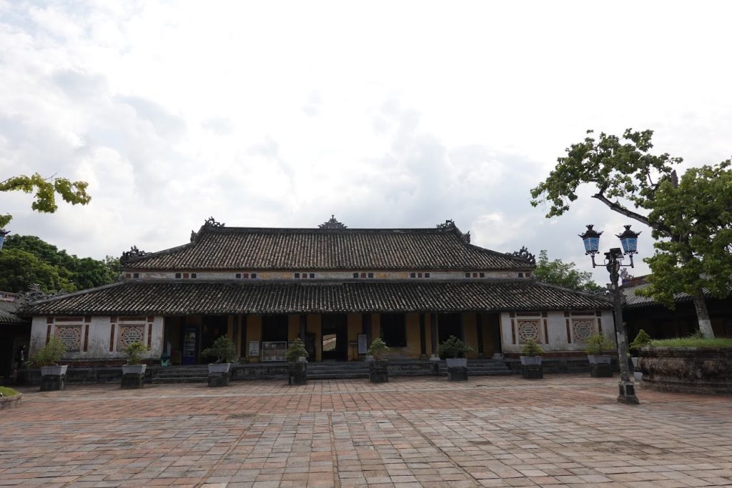 Can Chanh Palace in the Hue Imperial City, showcasing intricate woodwork and royal architecture.