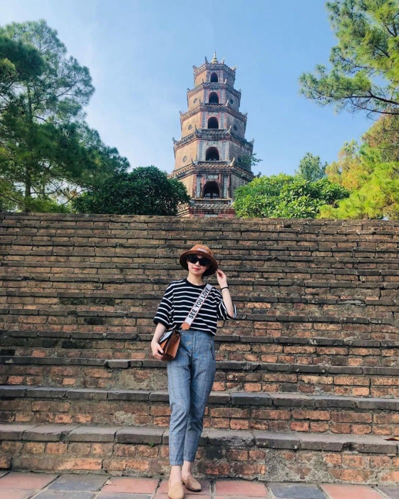 Casual outfit with a shirt and jeans for sightseeing in Hue