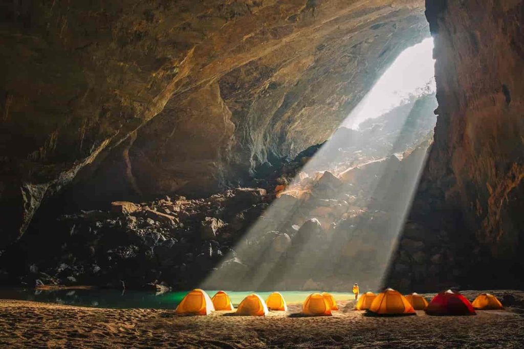 Inside Hang Én Cave, Quang Binh, Vietnam – the third-largest cave in the world with stunning natural formations and swallows flying through.