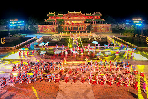 Colorful festival celebrations in the Imperial City of Hue, with traditional performances and decorations.