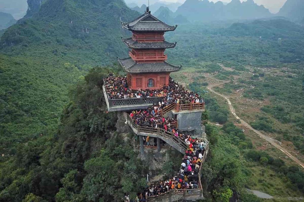 Ngoc Pagoda’s Heaven Worship Platform made from red granite stone, offering spiritual tranquility.