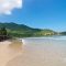 Sunny weather at Nha Trang beach in October, ideal for swimming and sightseeing.